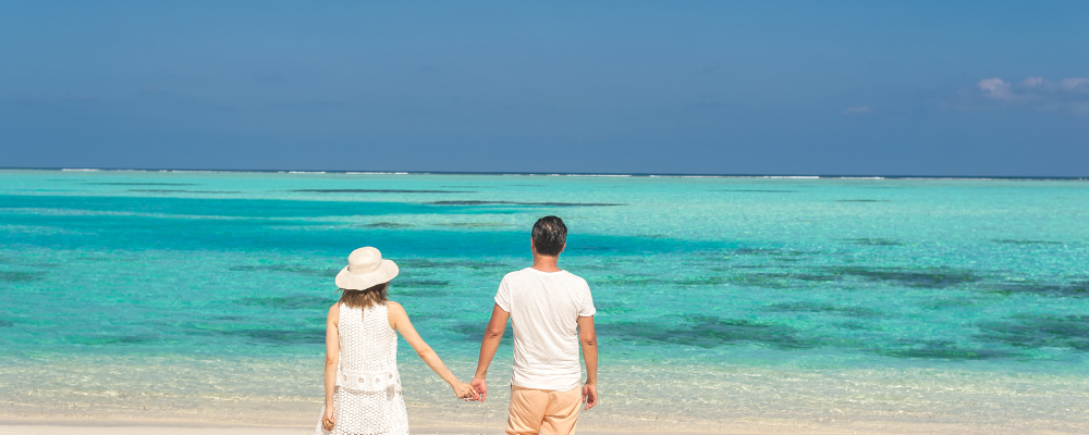 couple walking on beach