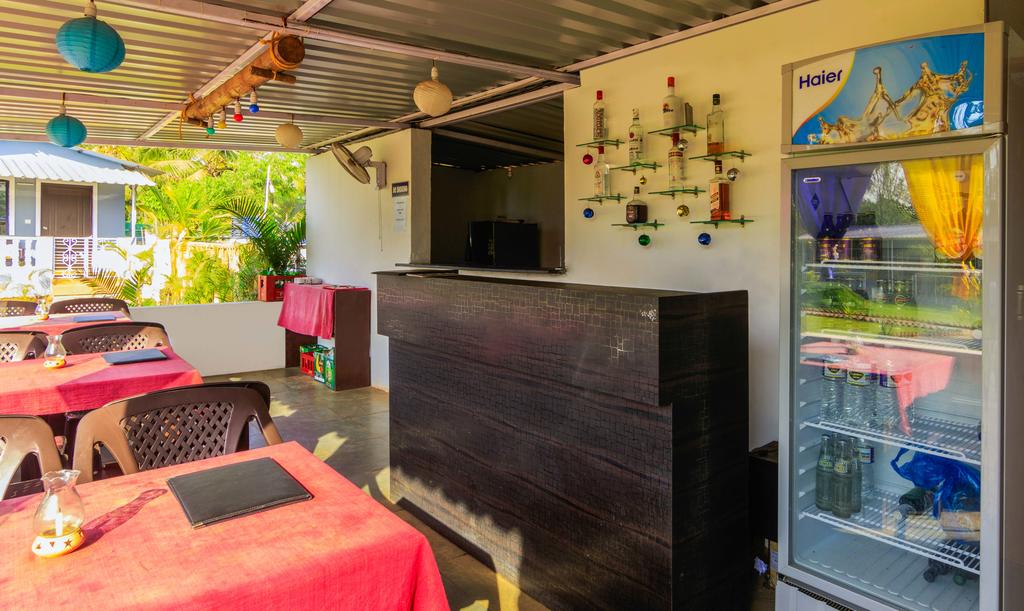 treebo lands end beach resort morjim