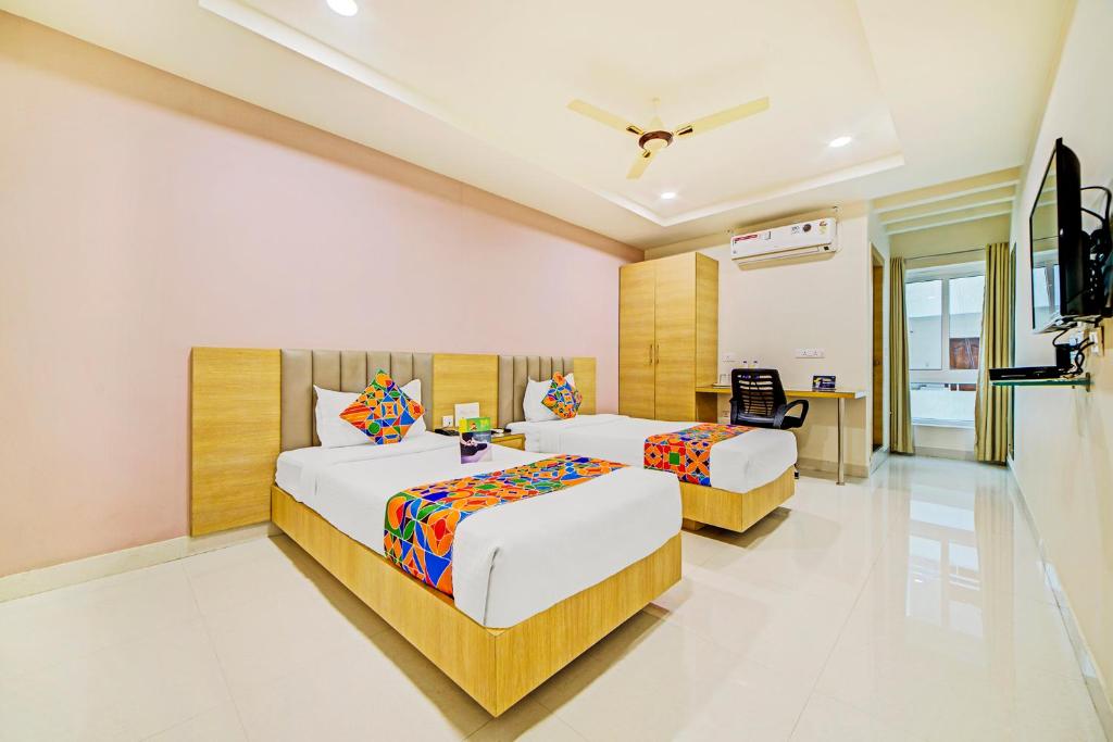 fabhotel prime viraj suites
