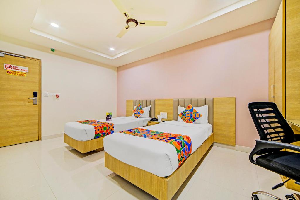 fabhotel prime viraj suites