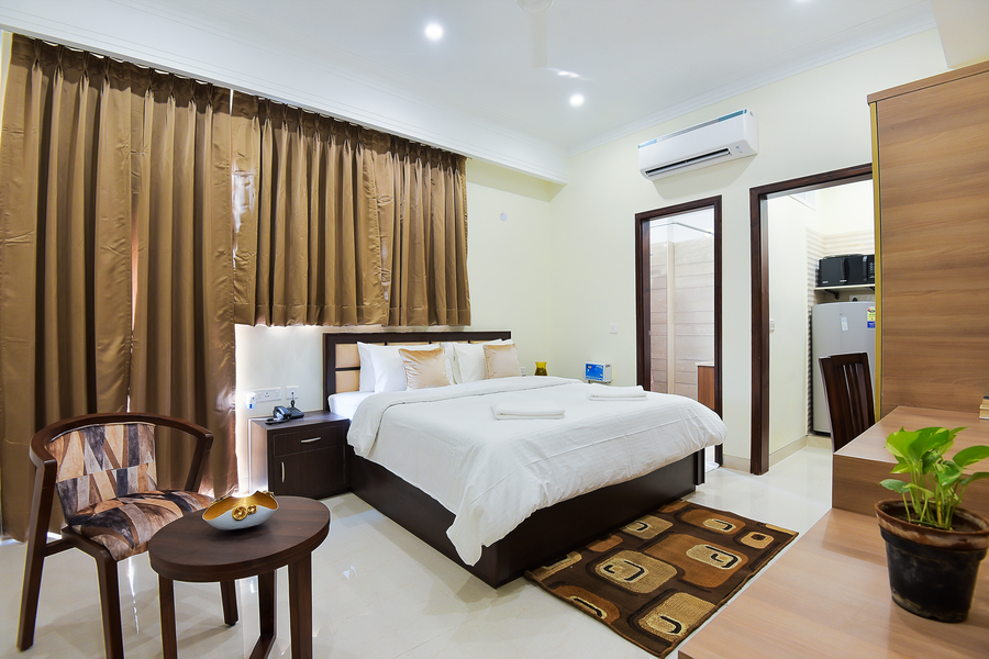 olive service apartment golf course road