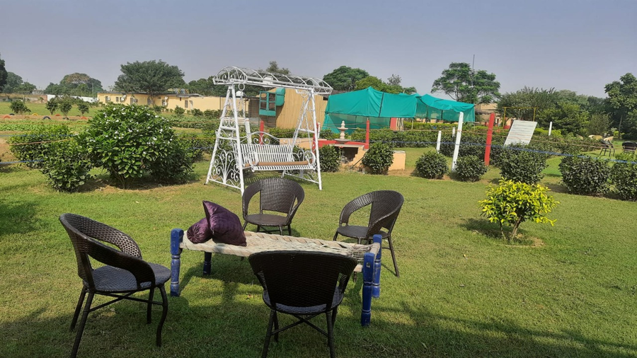 arise rustic village resort manesar