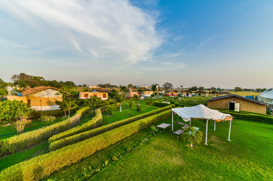 arise rustic village resort manesar