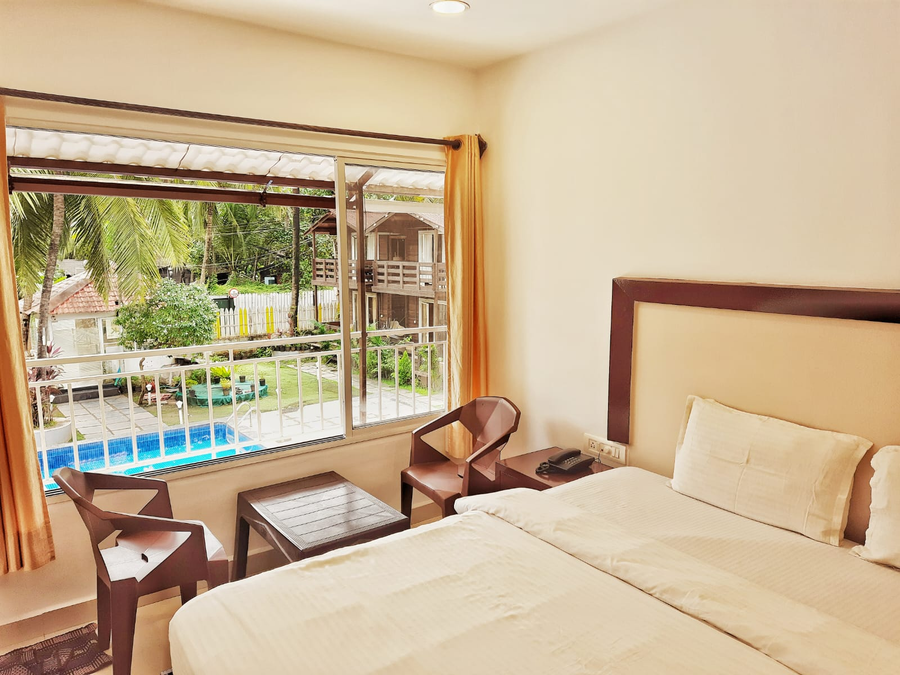 beach walk resort morjim by feather touch