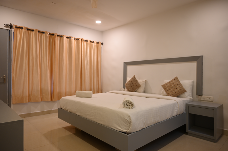 beach walk resort morjim by feather touch