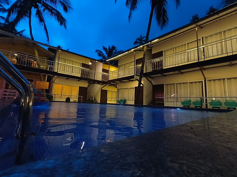 beach walk resort morjim by feather touch