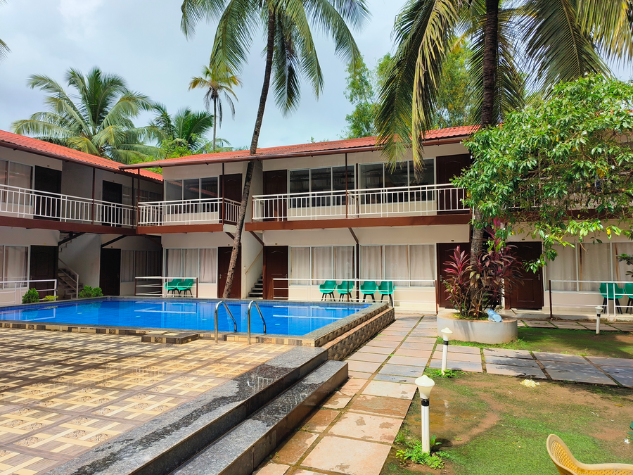 beach walk resort morjim by feather touch