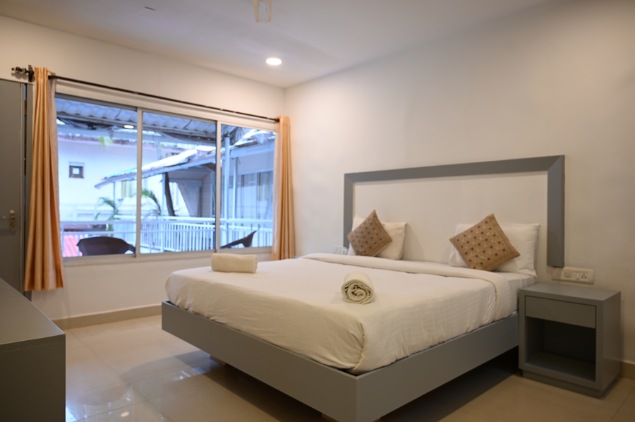 beach walk resort morjim by feather touch