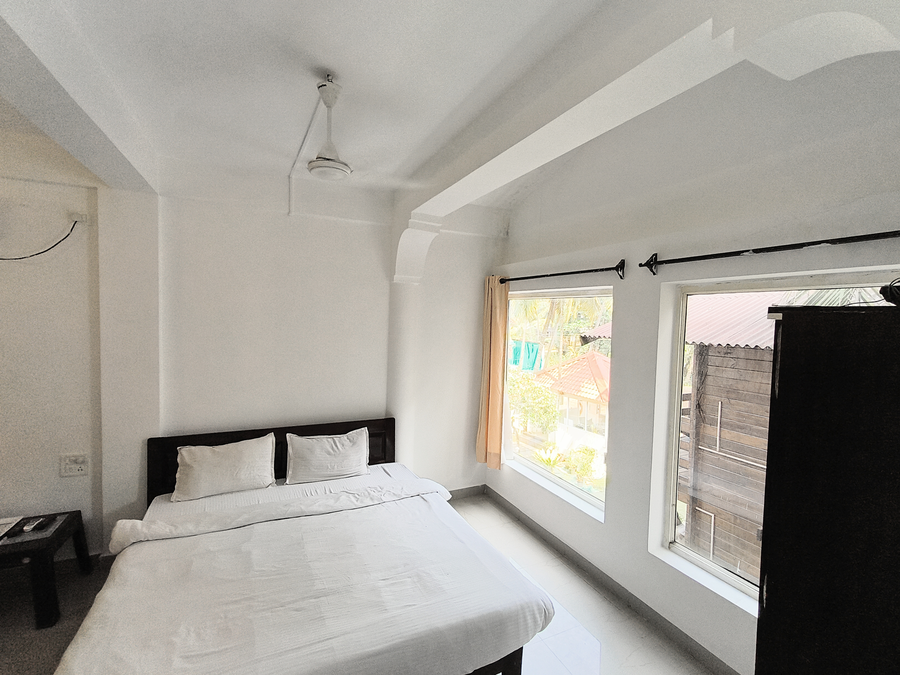 beach walk resort morjim by feather touch