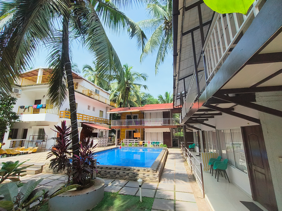 beach walk resort morjim by feather touch