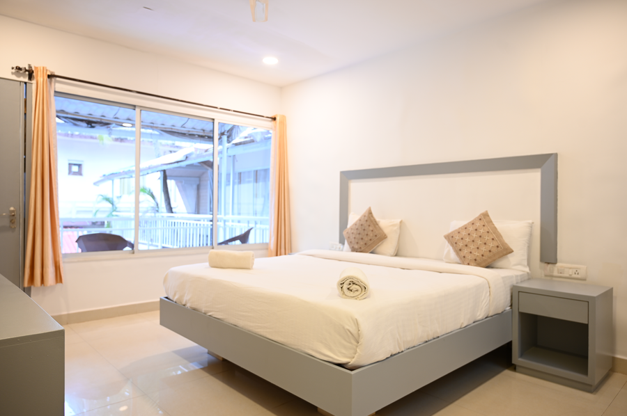 beach walk resort morjim by feather touch