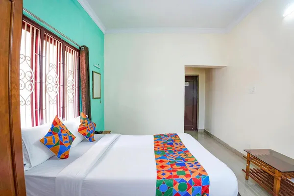 fabhotel the grand anukampa with swimming pool