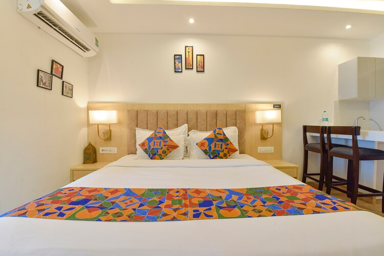 fabhotel the grand anukampa with swimming pool