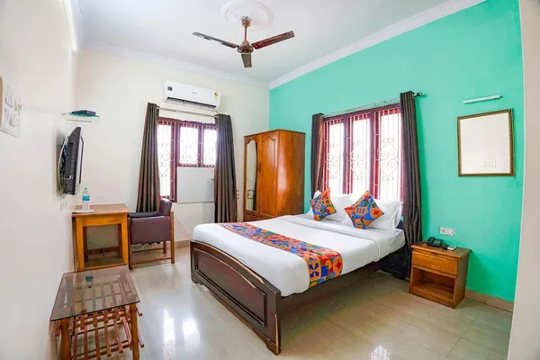 fabhotel the grand anukampa with swimming pool