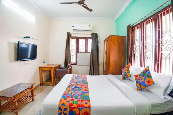 fabhotel the grand anukampa with swimming pool