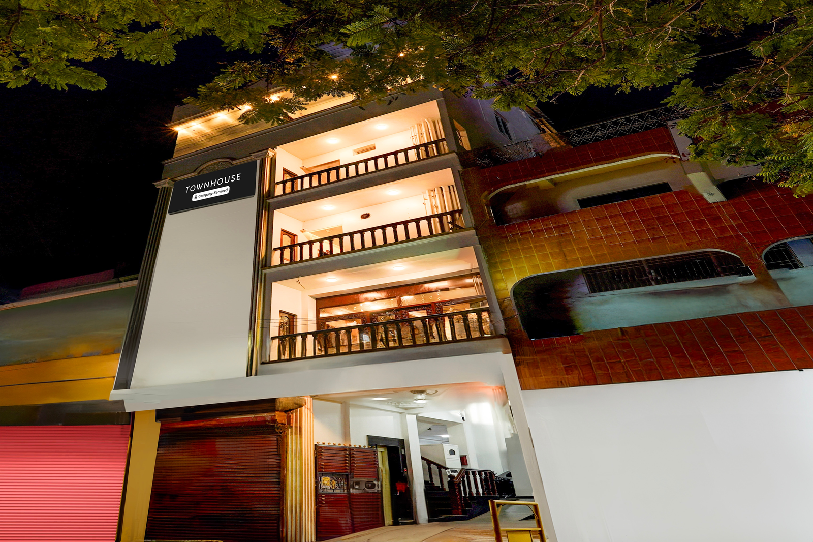 super townhouse white town near rock beach