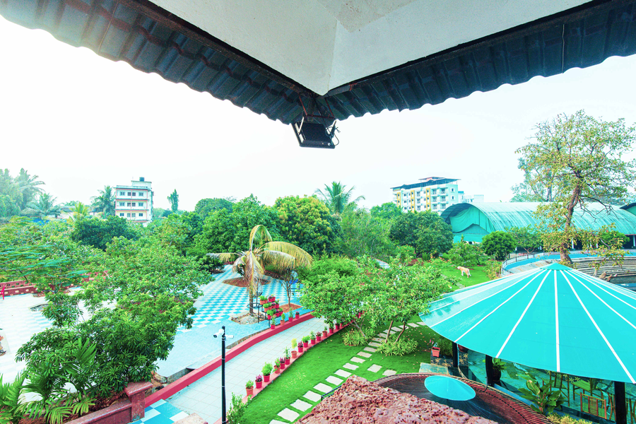 treebo green village resort with pool