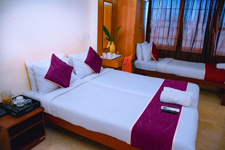 naksha tree hotels kishore inn koyambedu