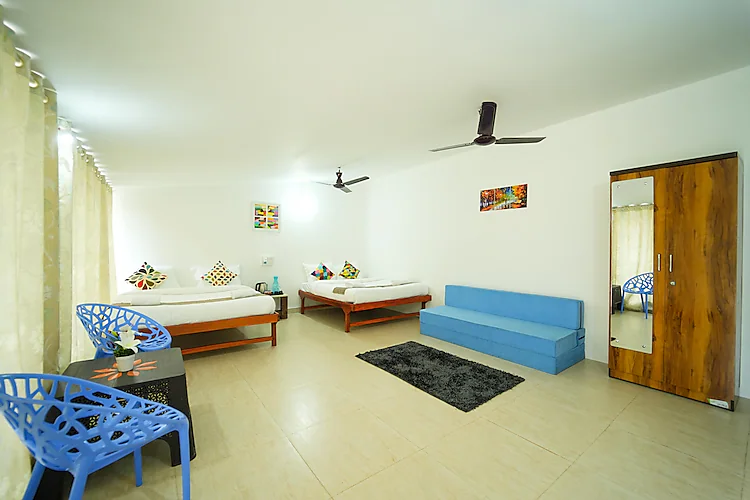 the enchanted nest luxurious cottages near akshi beach