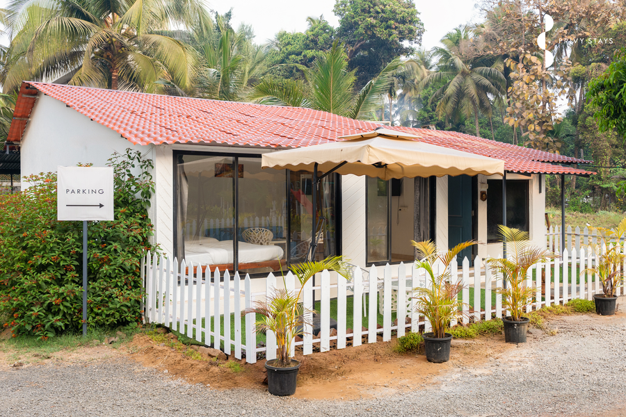 the enchanted nest luxurious cottages near akshi beach