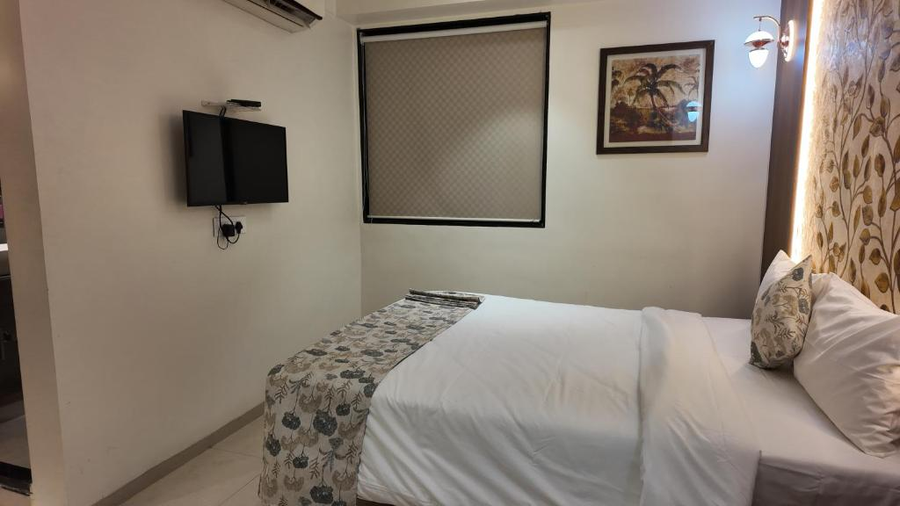 the palm regency beacon vapi