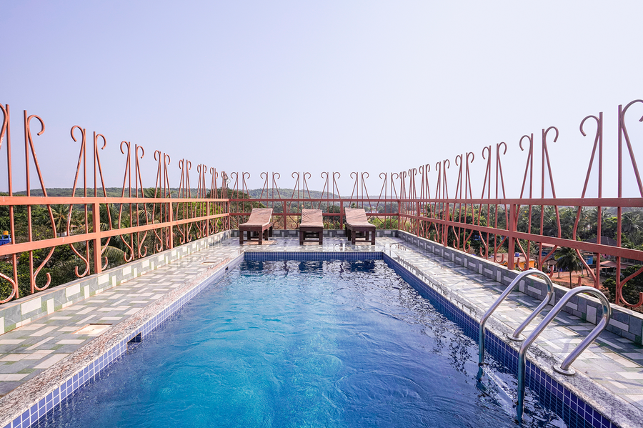 fabhotel pushpa inn assagao