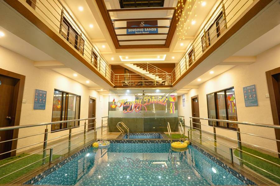 singing sands beach resort