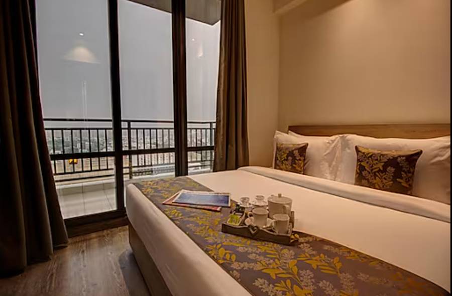 Rhythm Gurugram Hotel & Suites, Sohna Road,Dlf Phase 4 Galleria Market,4 star