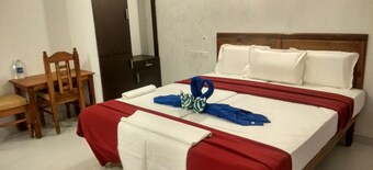 Hotel Neptune Kovalam,South P.O, Light House Beach Rd, Avaduthura, Kovalam, Kerala 695527,2 star